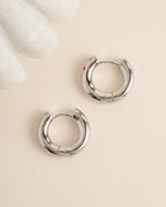 Silver stainless steel SS thick tube hoop earrings by Sami Jewels, waterproof and stylish for everyday wear.