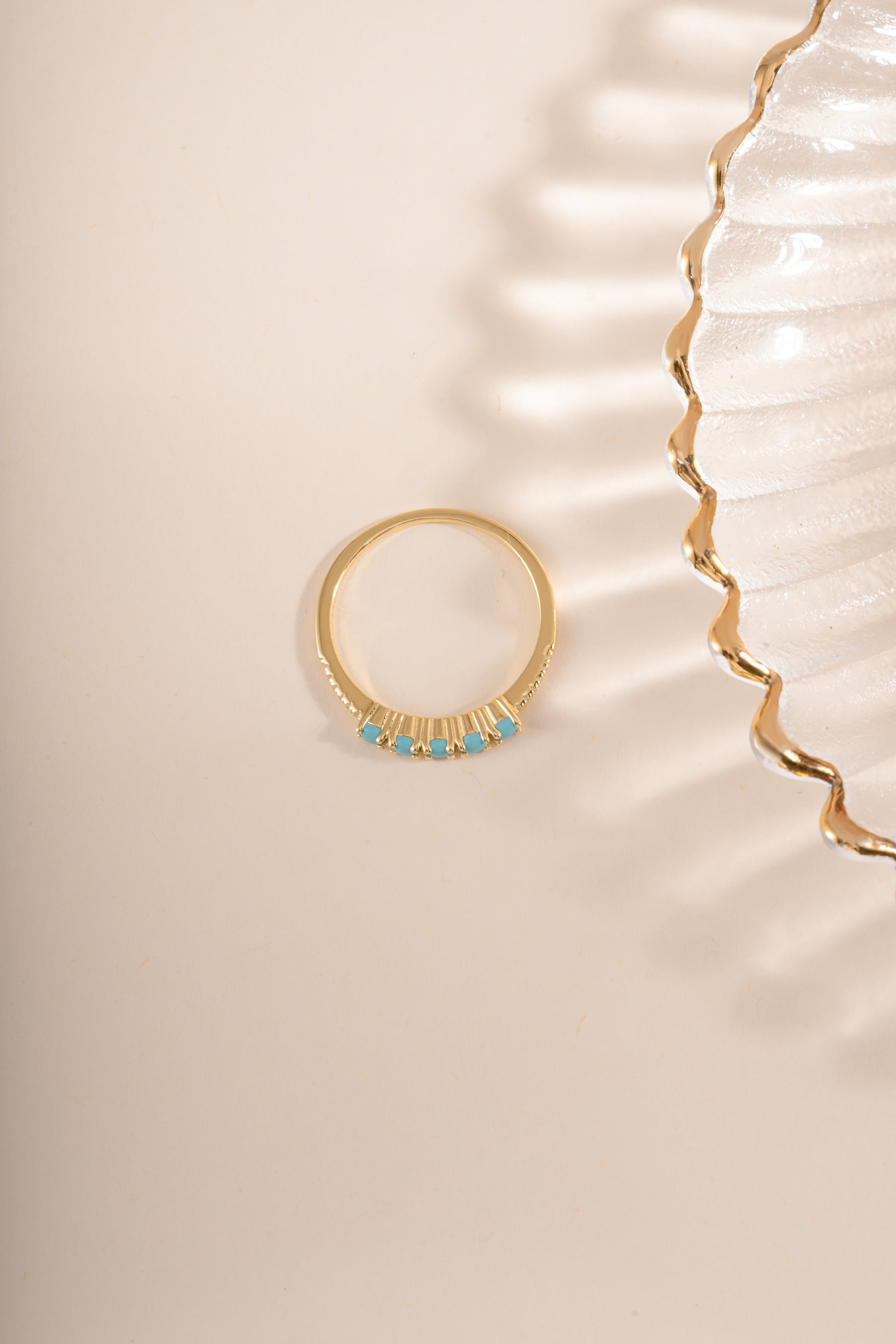 Gold 5 stone turquoise ring by Sami Jewels, featuring five vibrant turquoise stones set in a stylish ring design.