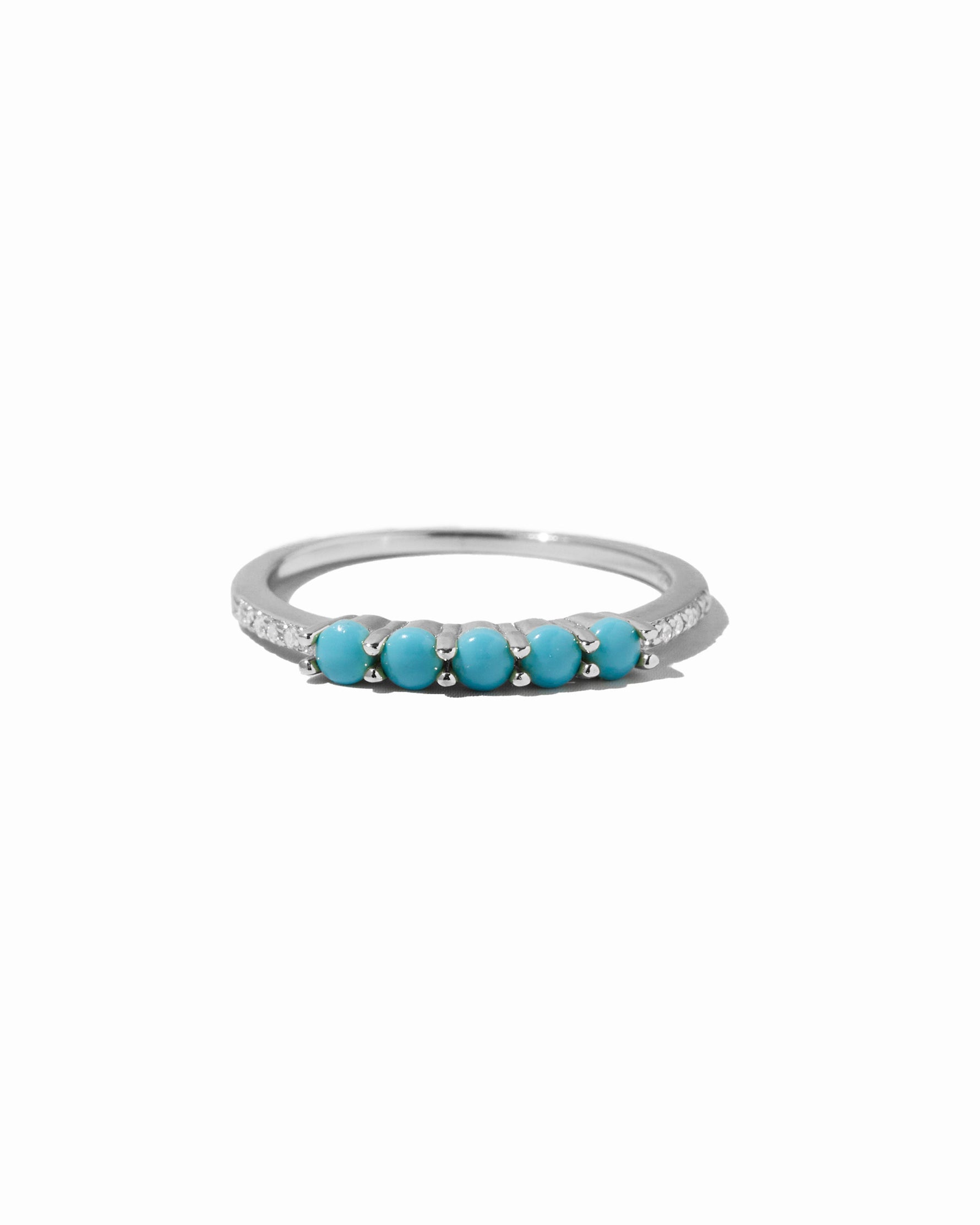 Sterling silver 5-stone turquoise ring by Sami Jewels featuring vibrant turquoise stones on a white background.