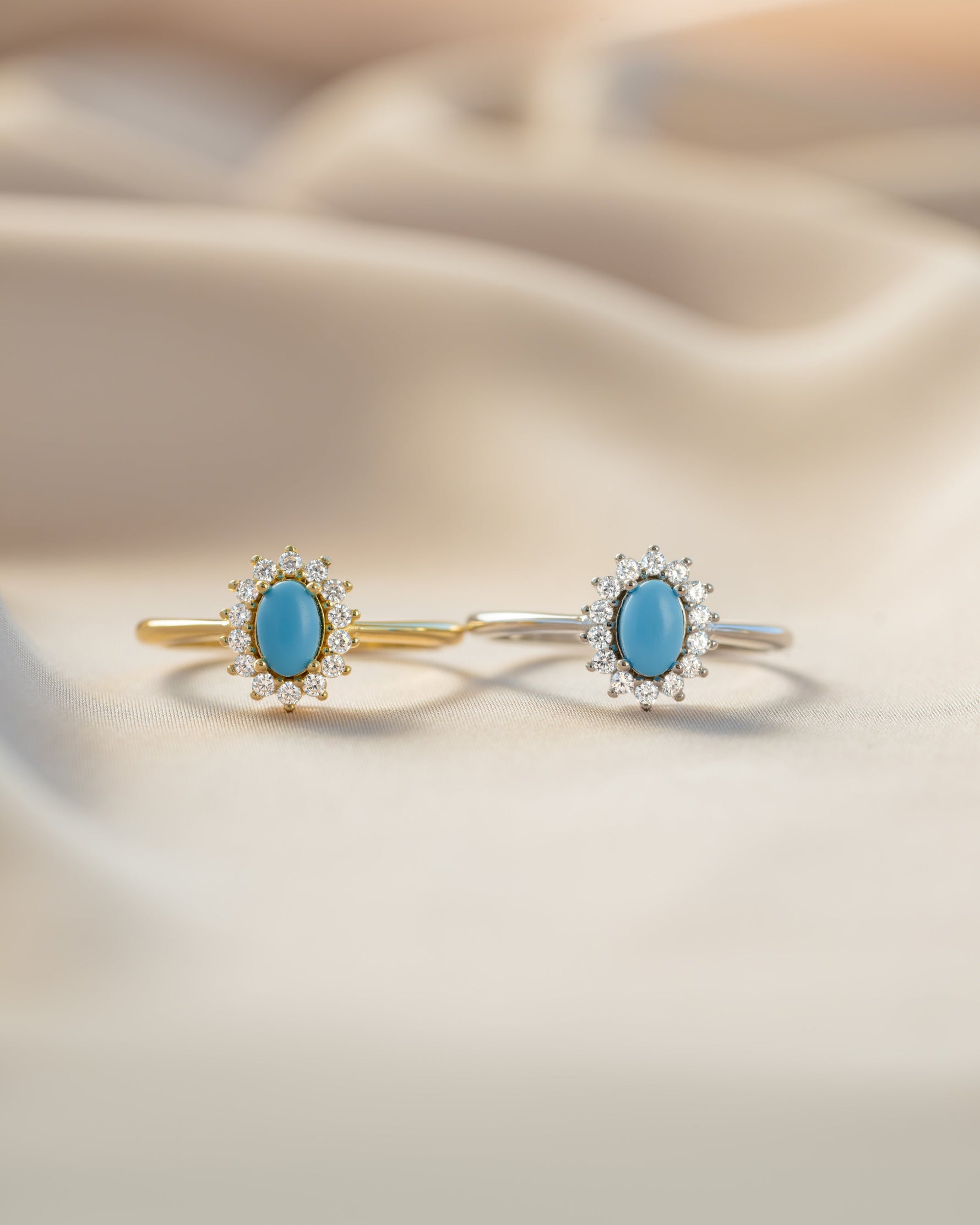 Sami Jewels Layla turquoise oval halo ring with gold and sterling silver setting, featuring a vibrant turquoise gemstone.