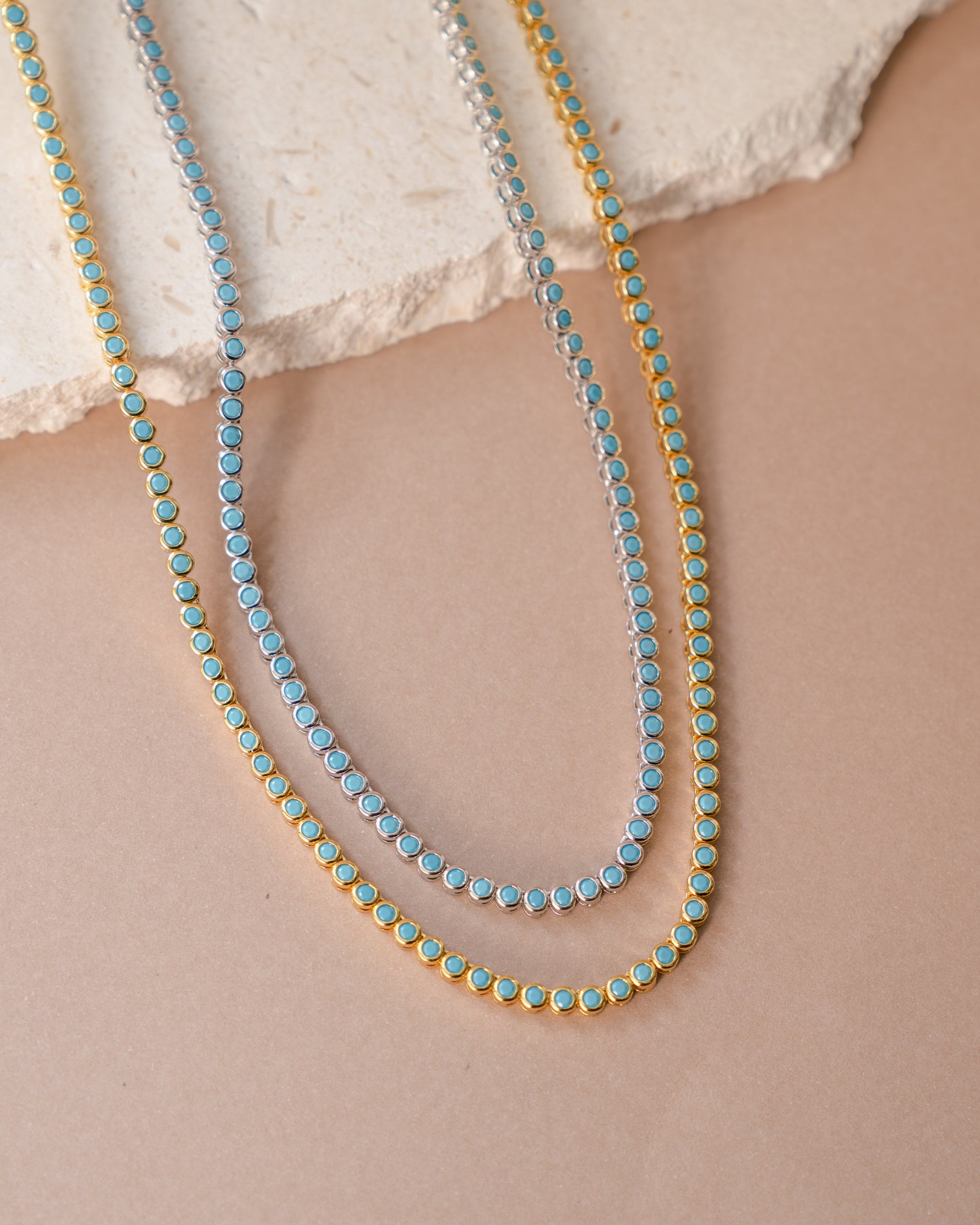 Round turquoise tennis necklace by Sami Jewels featuring bezel-set turquoise stones on a delicate chain.