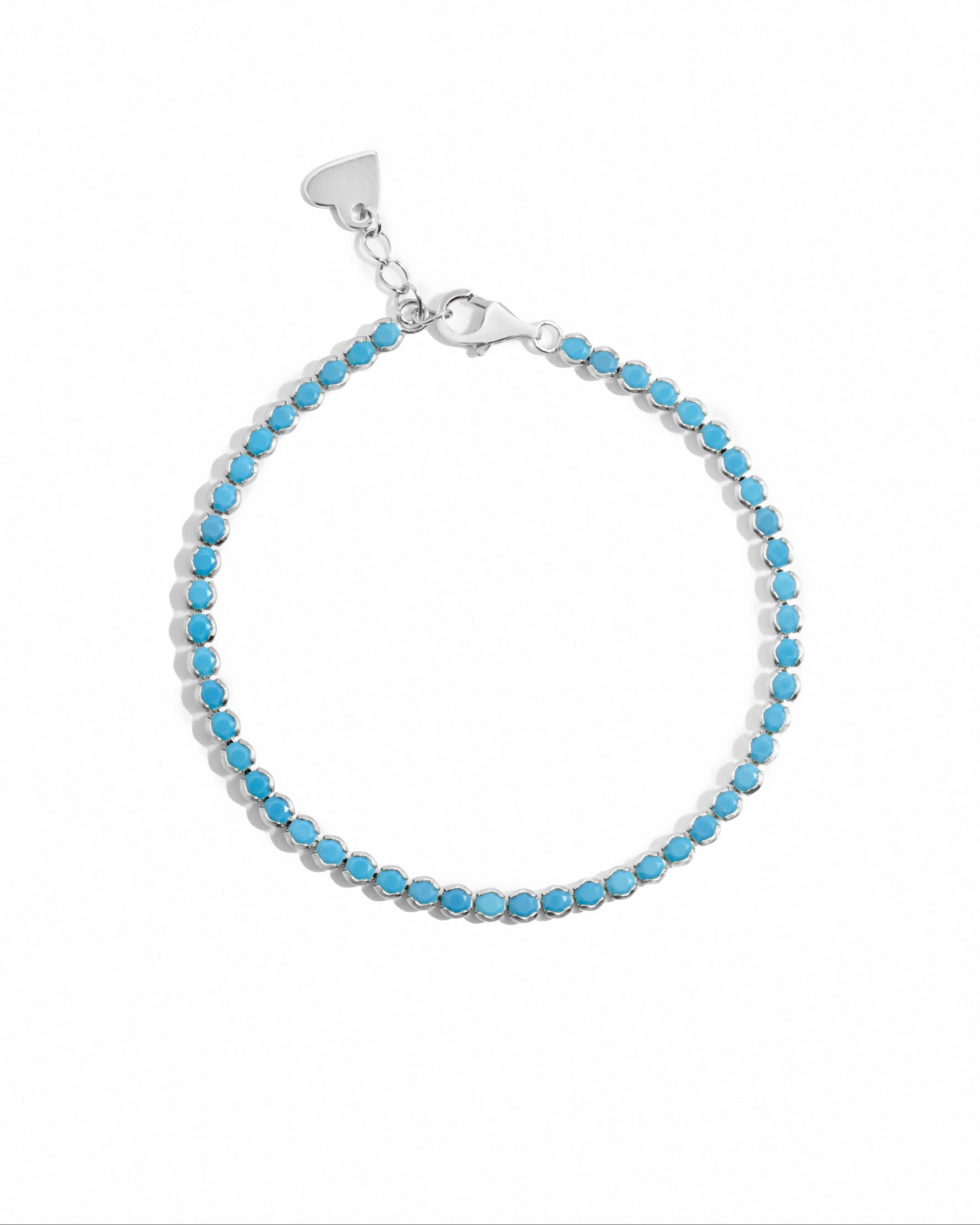 turquoise tennis bracelet in sterling silver on a white background