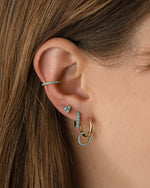 Gold Sami Jewels turquoise three-stone stud earrings with vibrant turquoise stones and classic gold setting.