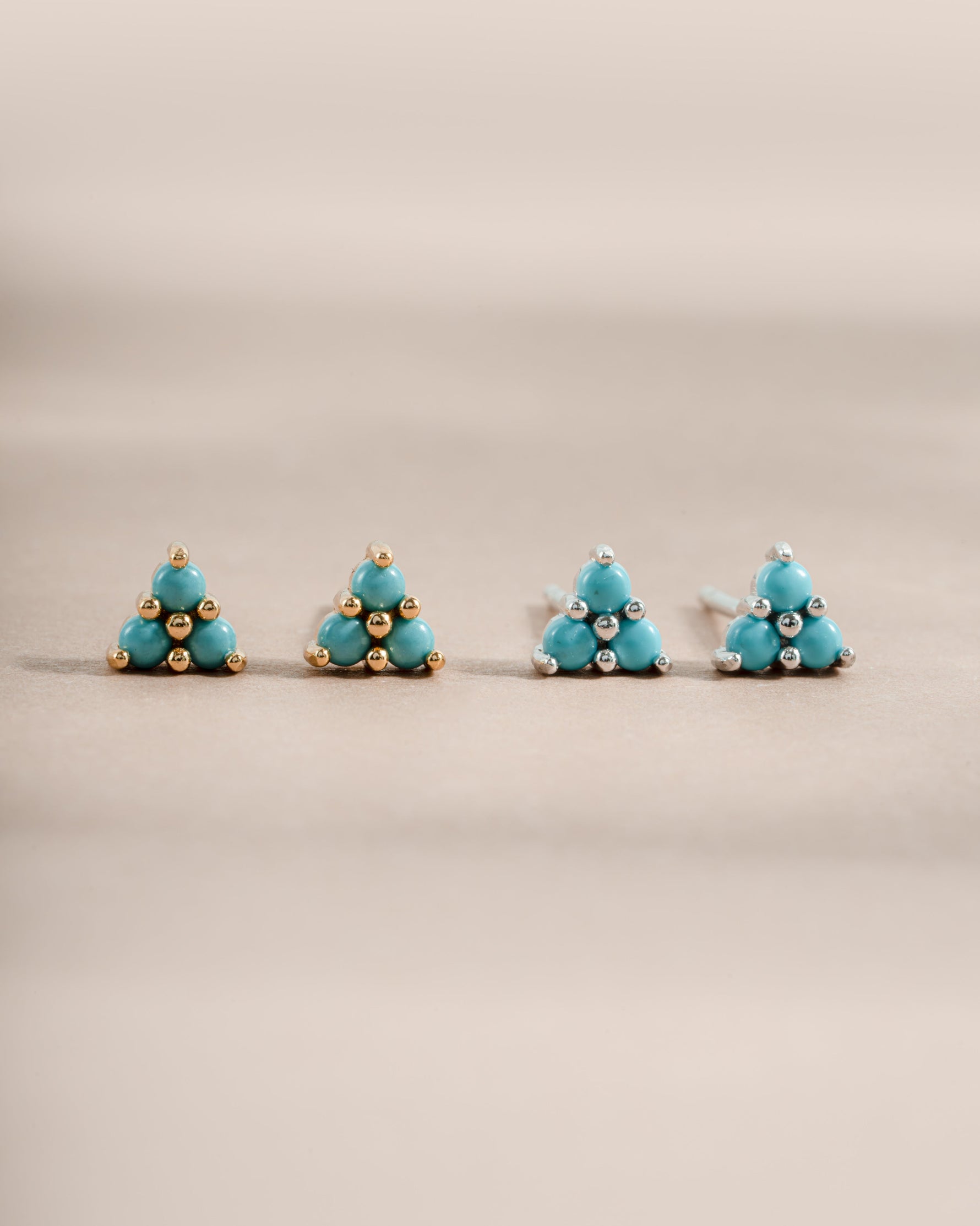 Turquoise three-stone stud earrings by Sami Jewels featuring gold and sterling silver settings.