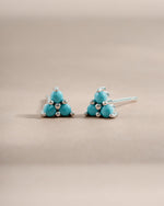 Turquoise Three Stone Stud Earrings in sterling silver by Sami Jewels, showcasing vibrant turquoise stones and classic stud design.