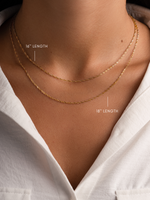 Gold thin twisted chain necklace from Sami Jewels, showcasing its delicate and elegant design.