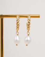 Gold spiral pearl drop earrings featuring twisted hoop design by Sami Jewels, dangle style with elegant pearls.