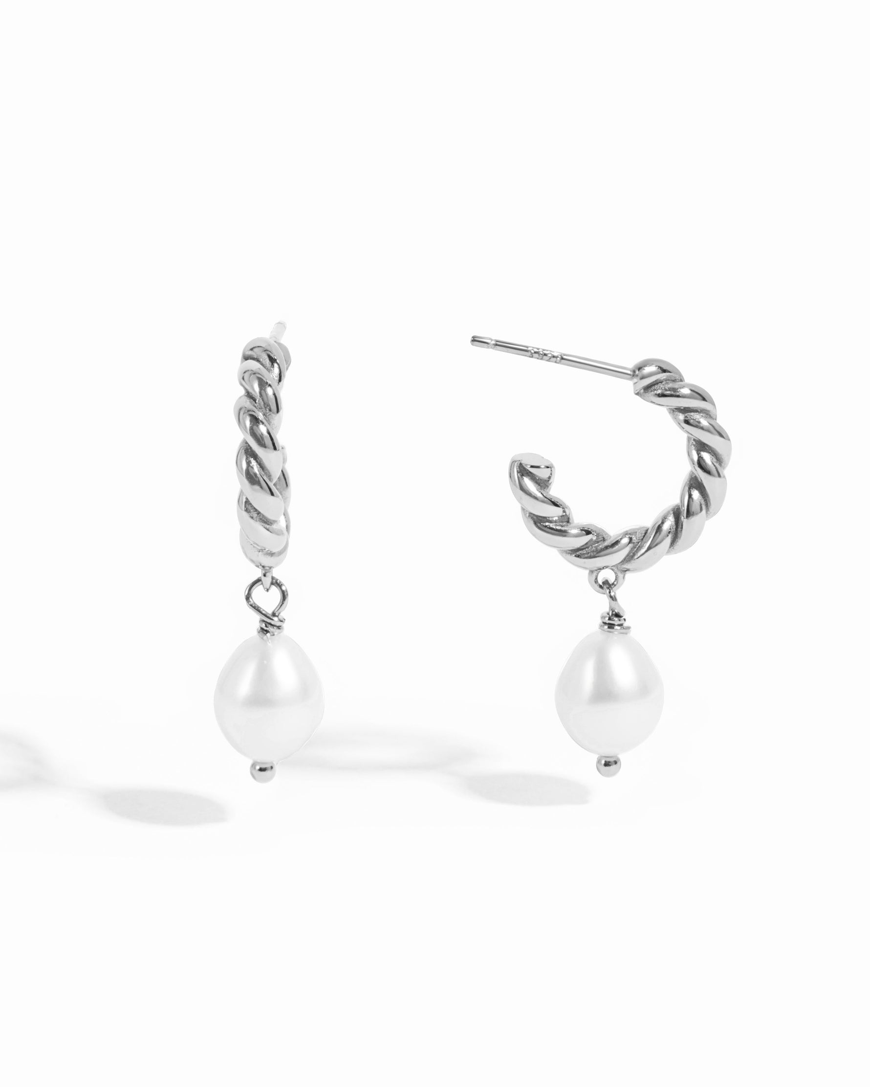 Sterling silver spiral pearl drop earrings with twisted hoop design from Sami Jewels, featuring elegant pearl accents.