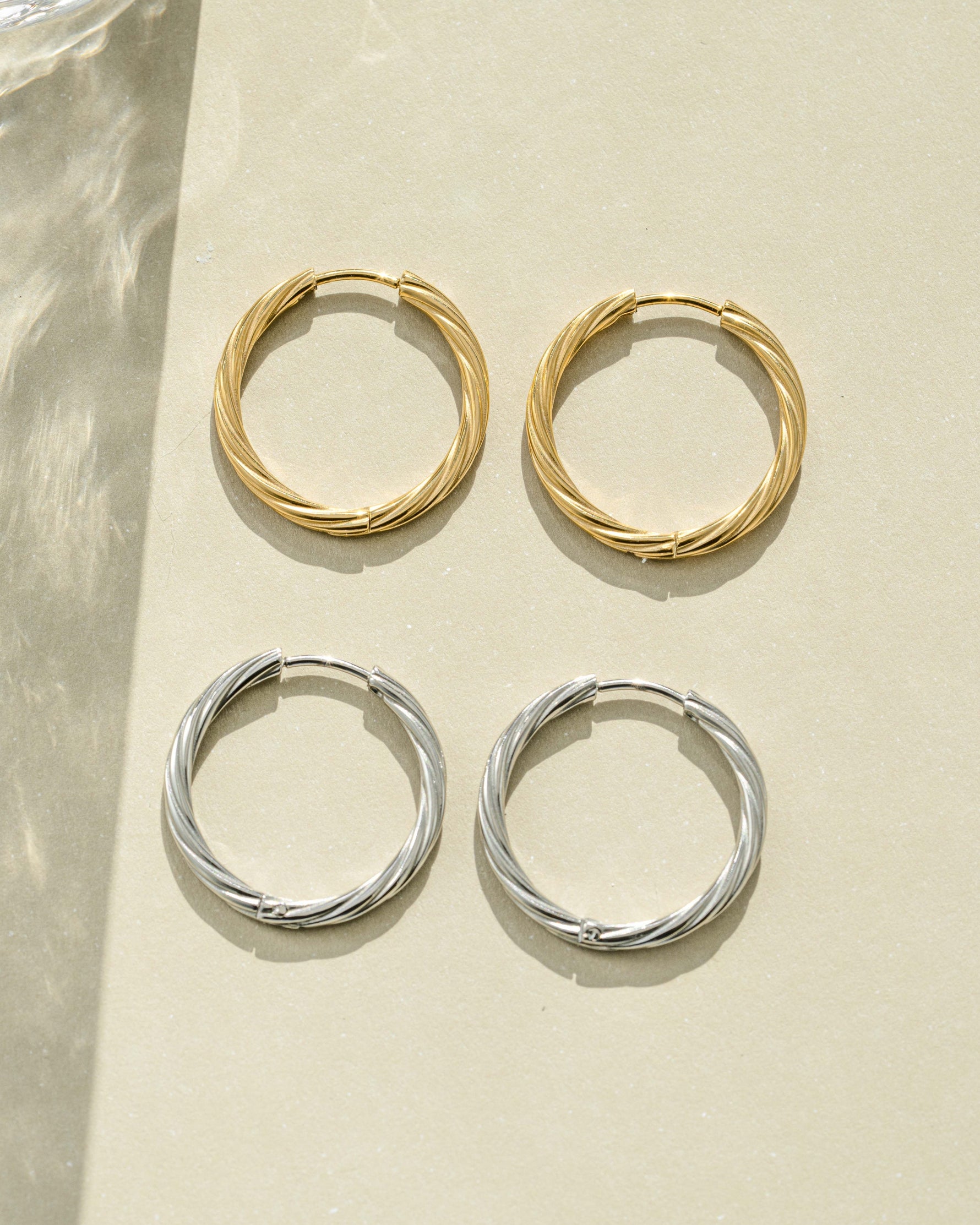 Sami Jewels SS Twisted Hoops earrings in gold, silver, and stainless steel with a twisted design, waterproof and stylish.