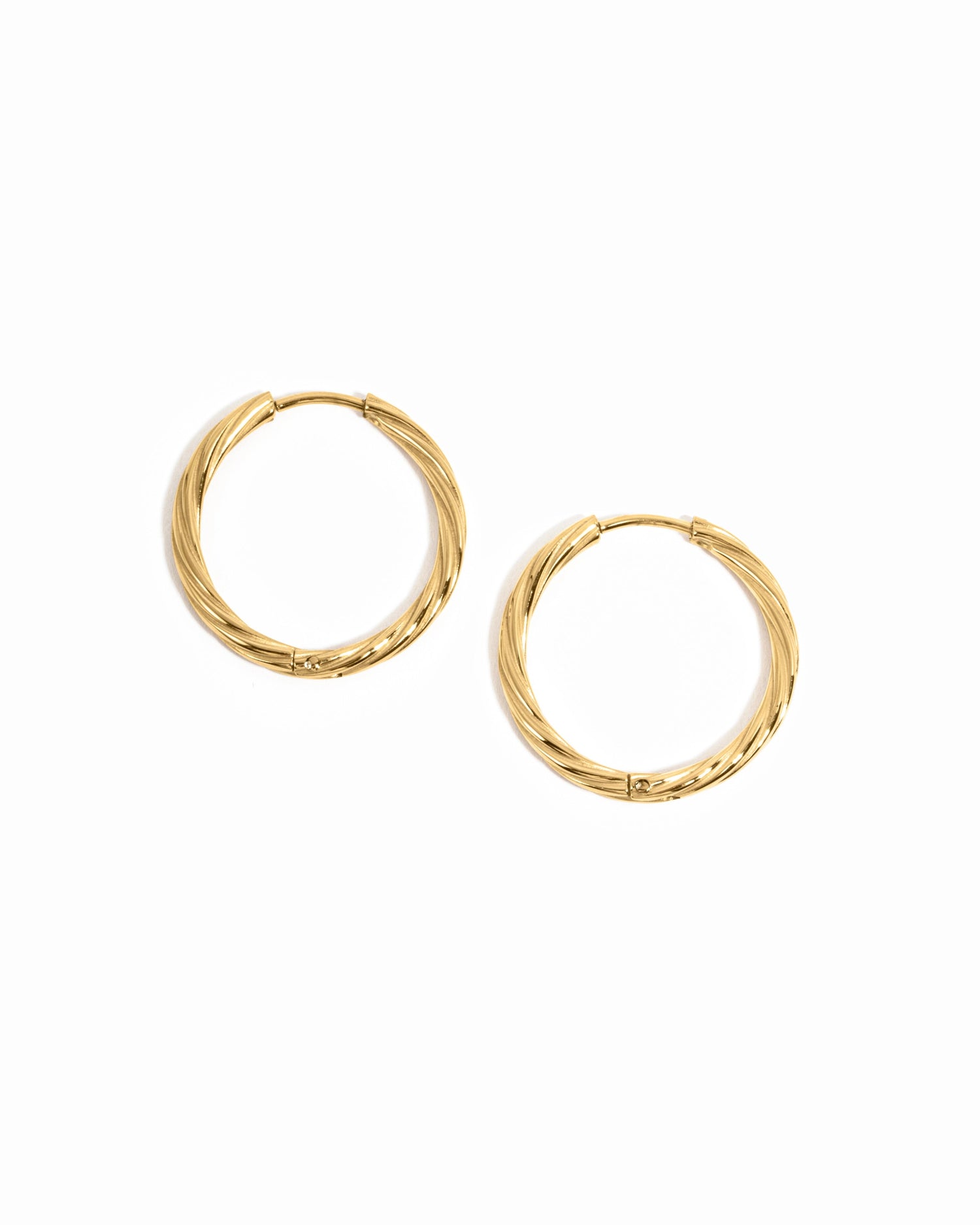 Gold stainless steel SS Twisted Hoops earrings by Sami Jewels, showcasing their twisted design and waterproof finish.