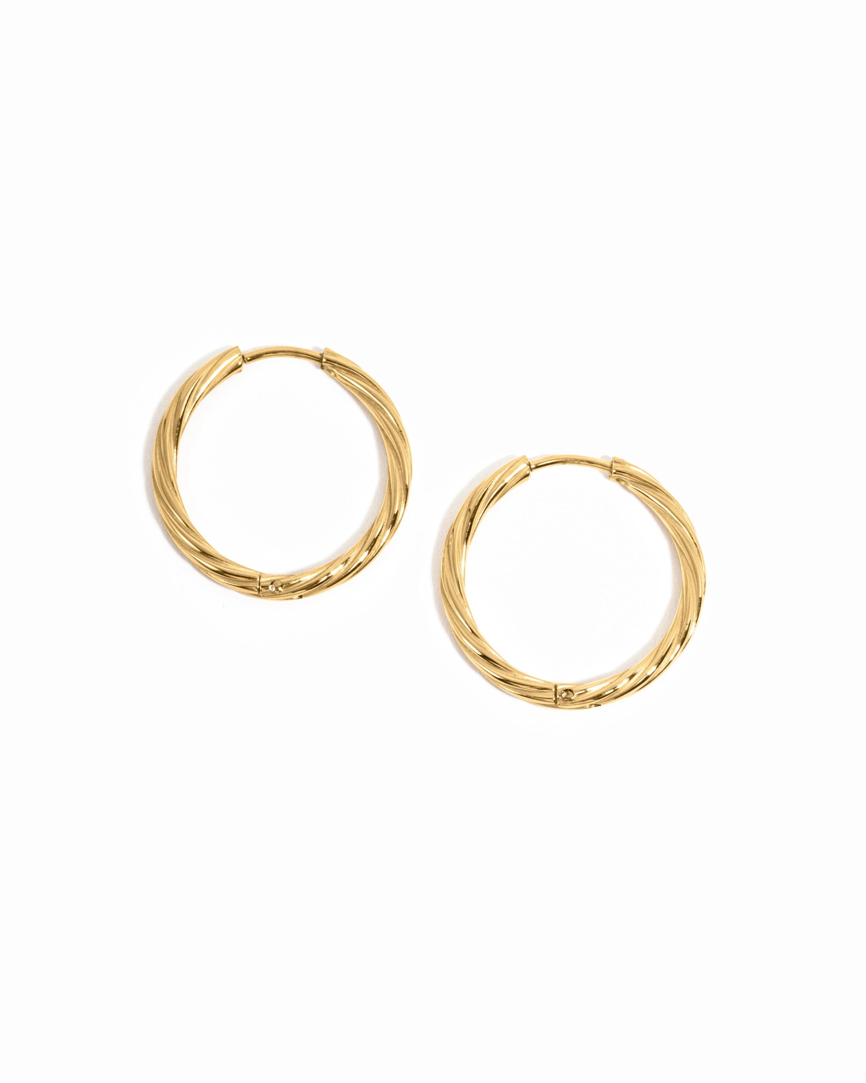 Gold stainless steel SS Twisted Hoops earrings by Sami Jewels, showcasing their twisted design and waterproof finish.