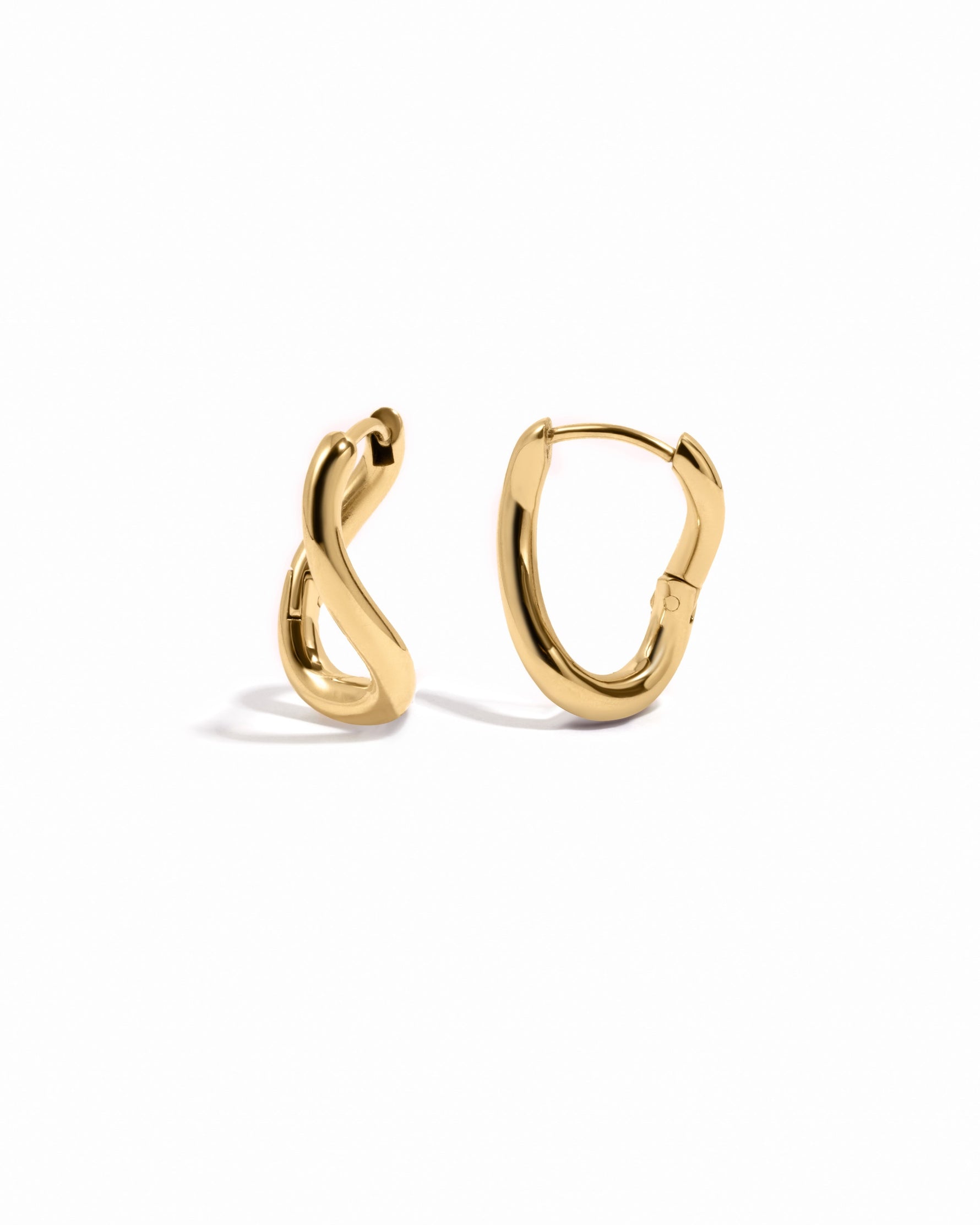Gold stainless steel SS twisted oval hoop earrings by Sami Jewels, showcasing a sleek, waterproof design.