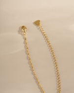Gold twisted rope chain necklace with lobster clasp closure by Sami Jewels, showcasing a sleek, elegant jewelry piece.