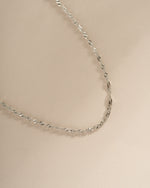 Close-up of a Sterling Silver Thin Twisted Rope Chain Necklace by Sami Jewels, showcasing its delicate twisted design.