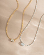 White CZ baguette bezel statement necklace by Sami Jewels featuring gold and sterling silver accents.