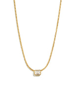 White CZ baguette bezel statement necklace by Sami Jewels featuring a bold gold chain and sparkling white cubic zirconia accents.