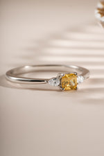 Close-up of Sami Jewels Citrine Cushion Ring featuring a vibrant yellow citrine stone set in sterling silver.