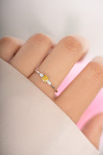 Yellow citrine cushion ring by Sami Jewels featuring sterling silver band on a model.