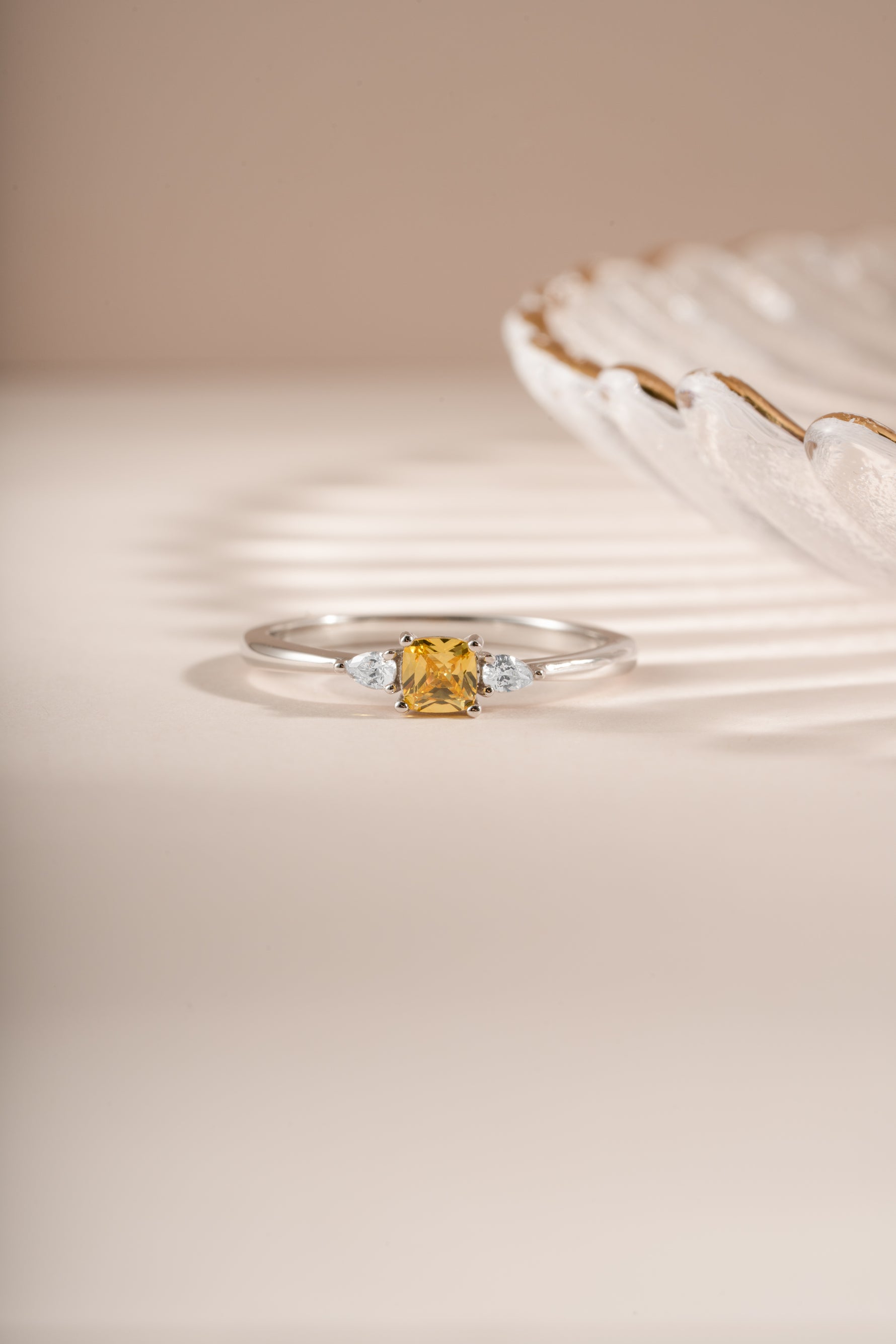 Yellow citrine cushion ring by Sami Jewels featuring sterling silver band and vibrant gemstone setting.