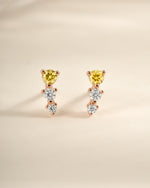 Yellow and diamond ear climber earrings by Sami Jewels, rose gold design with sparkling diamonds, front view showing elegant style.