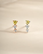 Yellow and diamond ear climber earrings by Sami Jewels, featuring sterling silver and rose gold accents.
