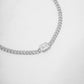 diamond bezel baguette charm on minimalist sterling silver curb chain bracelet