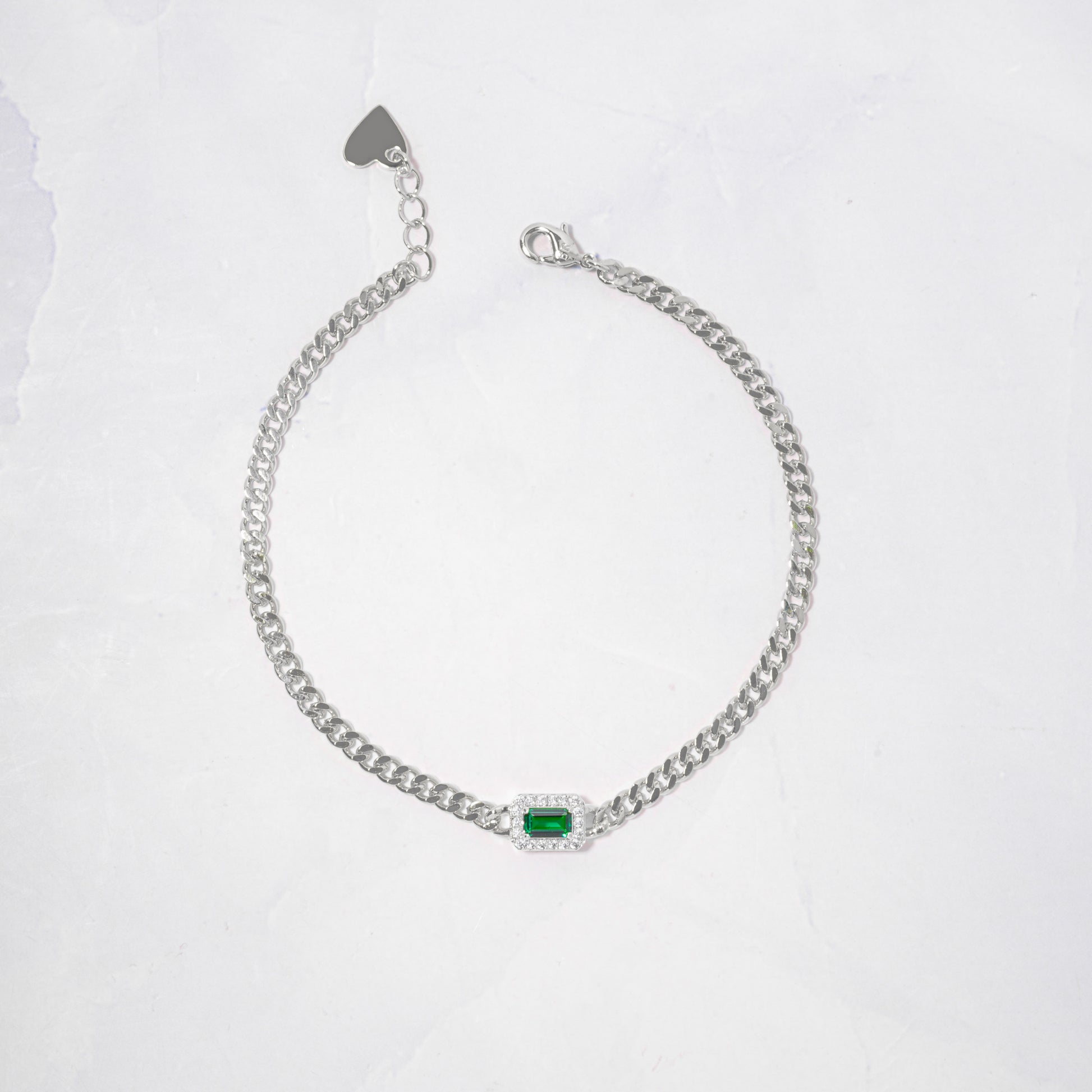 emerald and diamond charm on dainty sterling silver curb chain