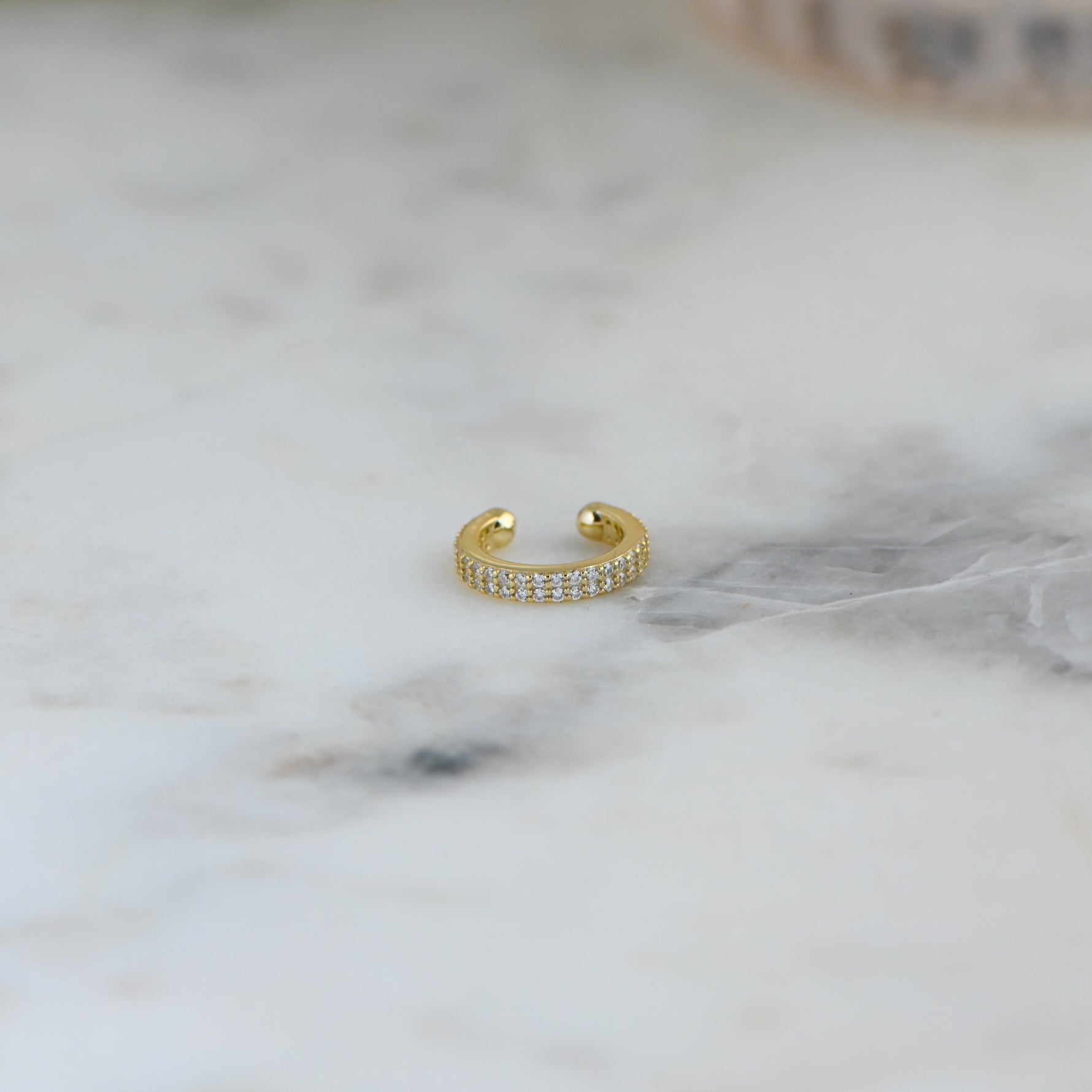 cubic zirconia ear cuff in gold