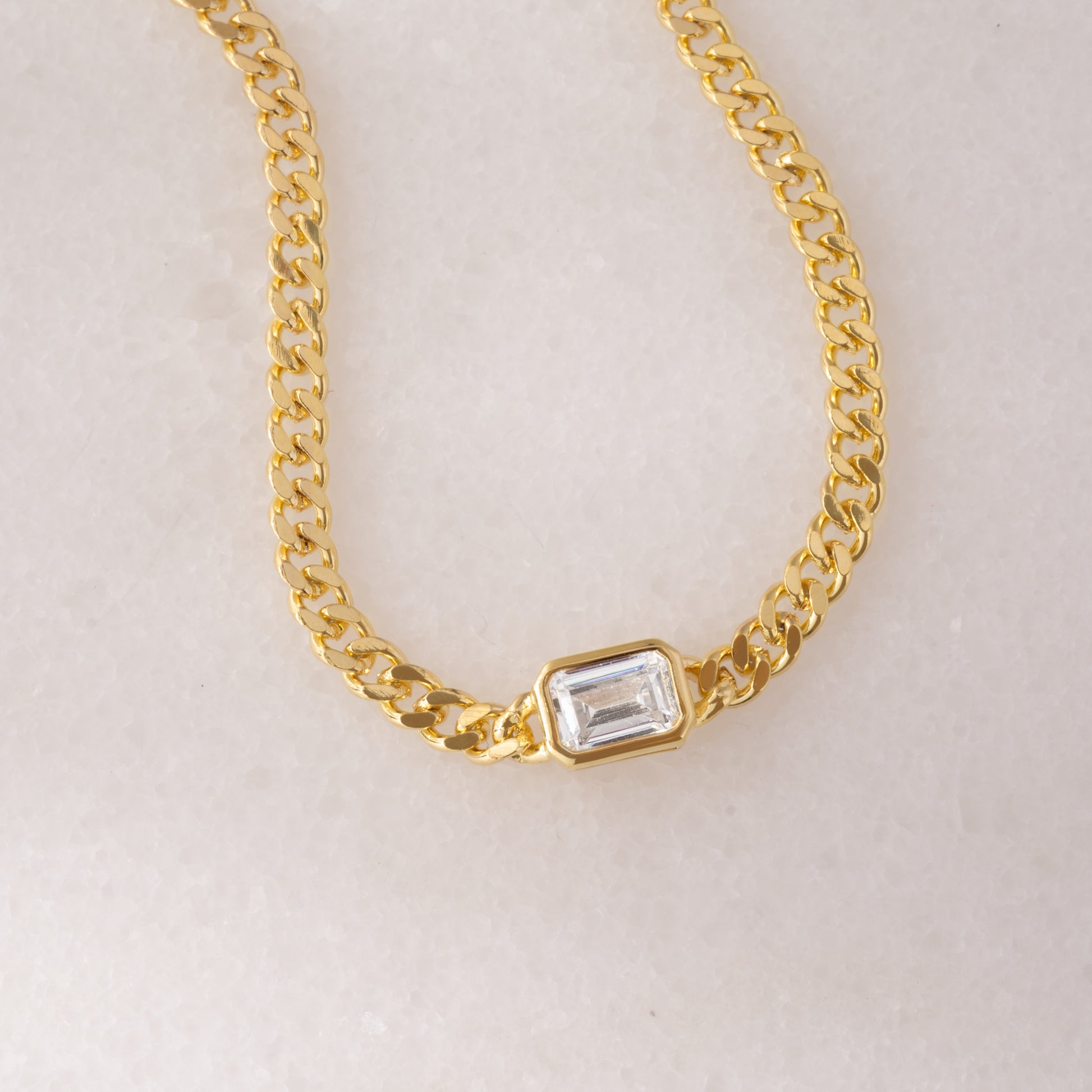 dainty gold curb chain bracelet with bezel baguette charm 