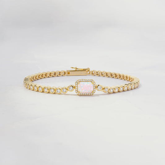 opal baguette charm on dainty gold tennis bracelet