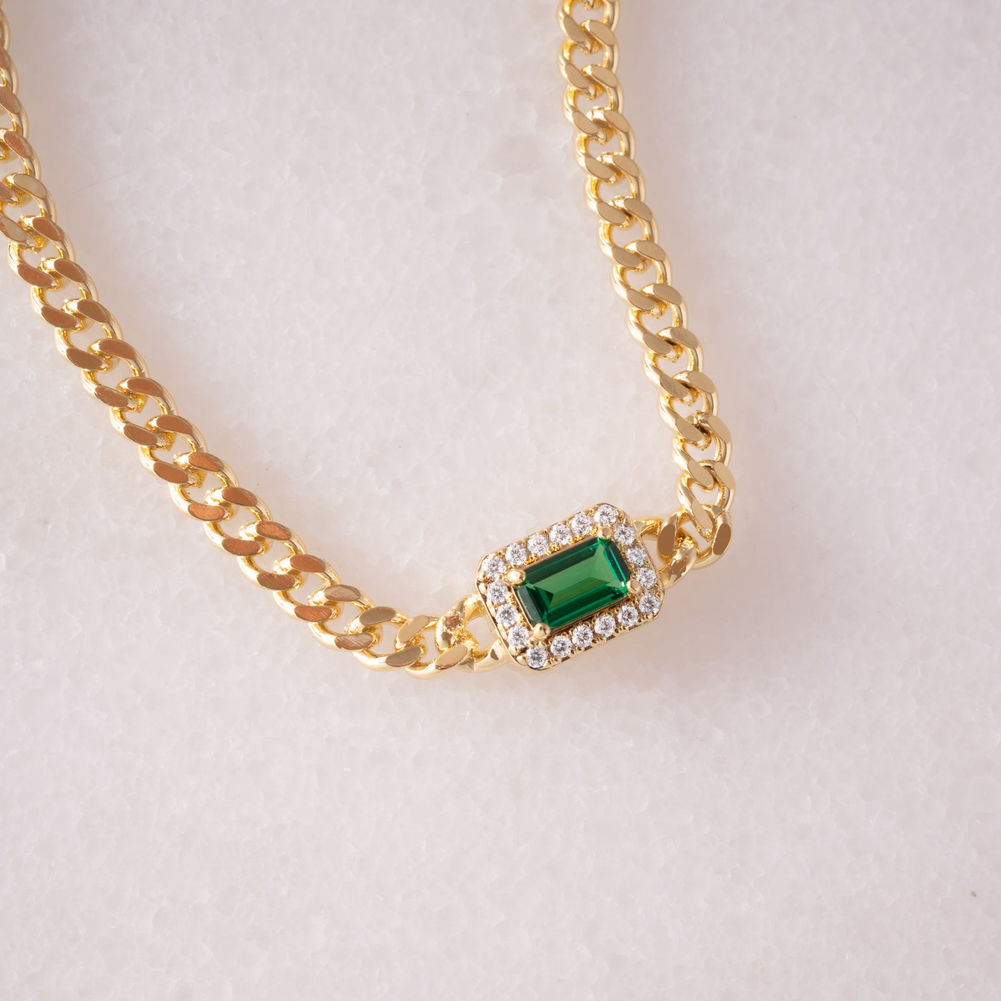 emerald and diamond charm on dainty gold curb chain