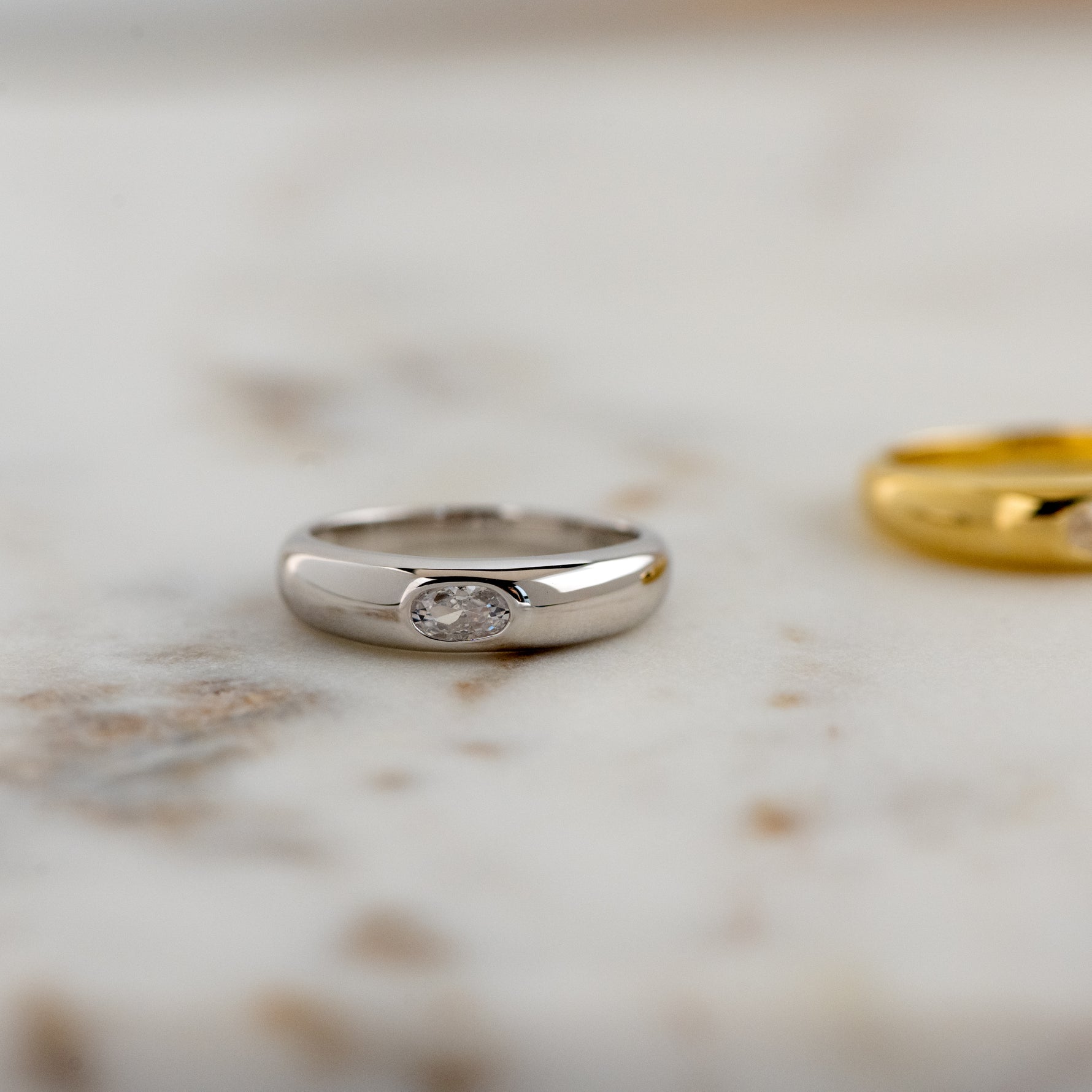 Sterling silver dome ring in soft studio lighting. 