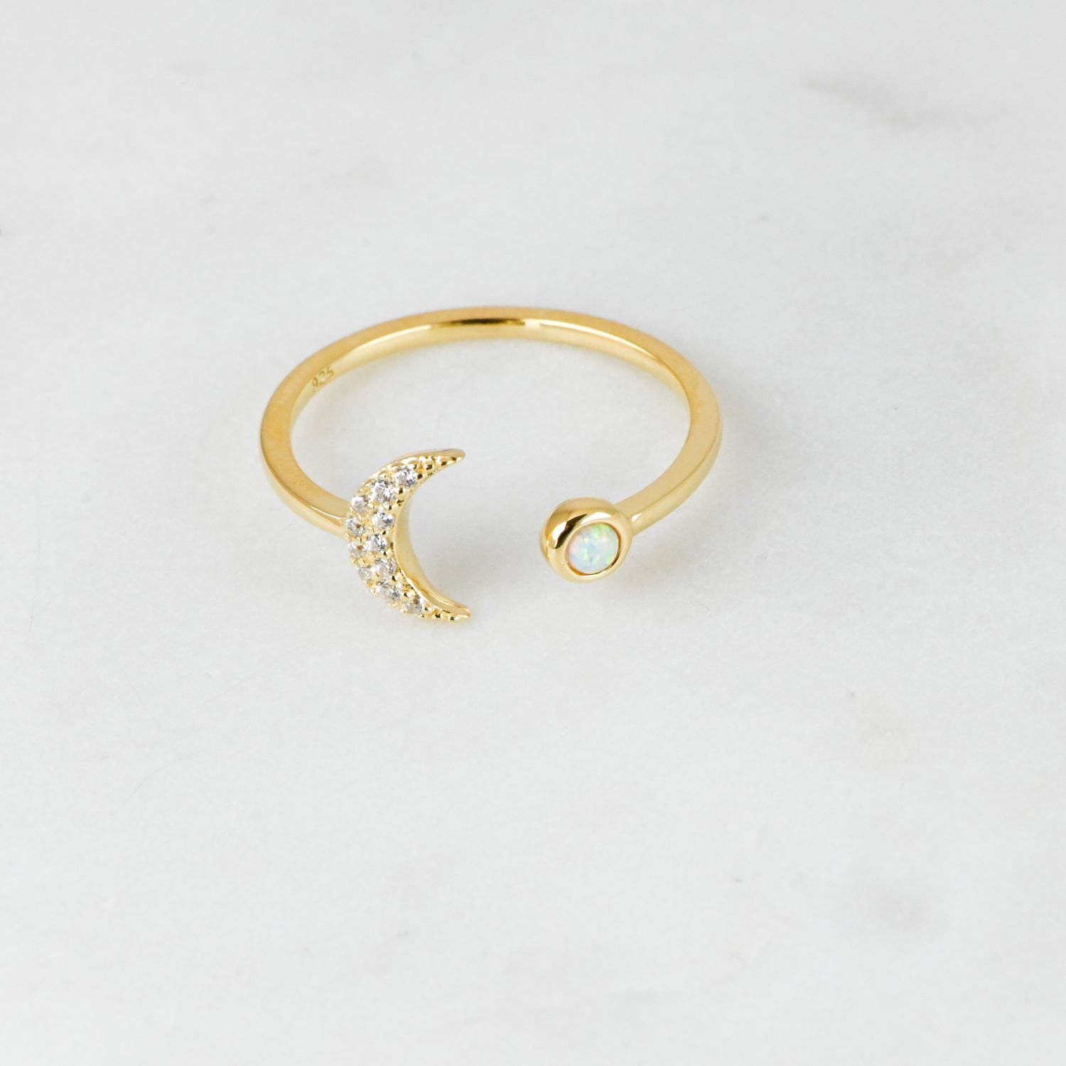 Gold opal and cz adjustable moon ring.