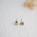 Aquamarine baguette stud earrings with gold plated metal. 