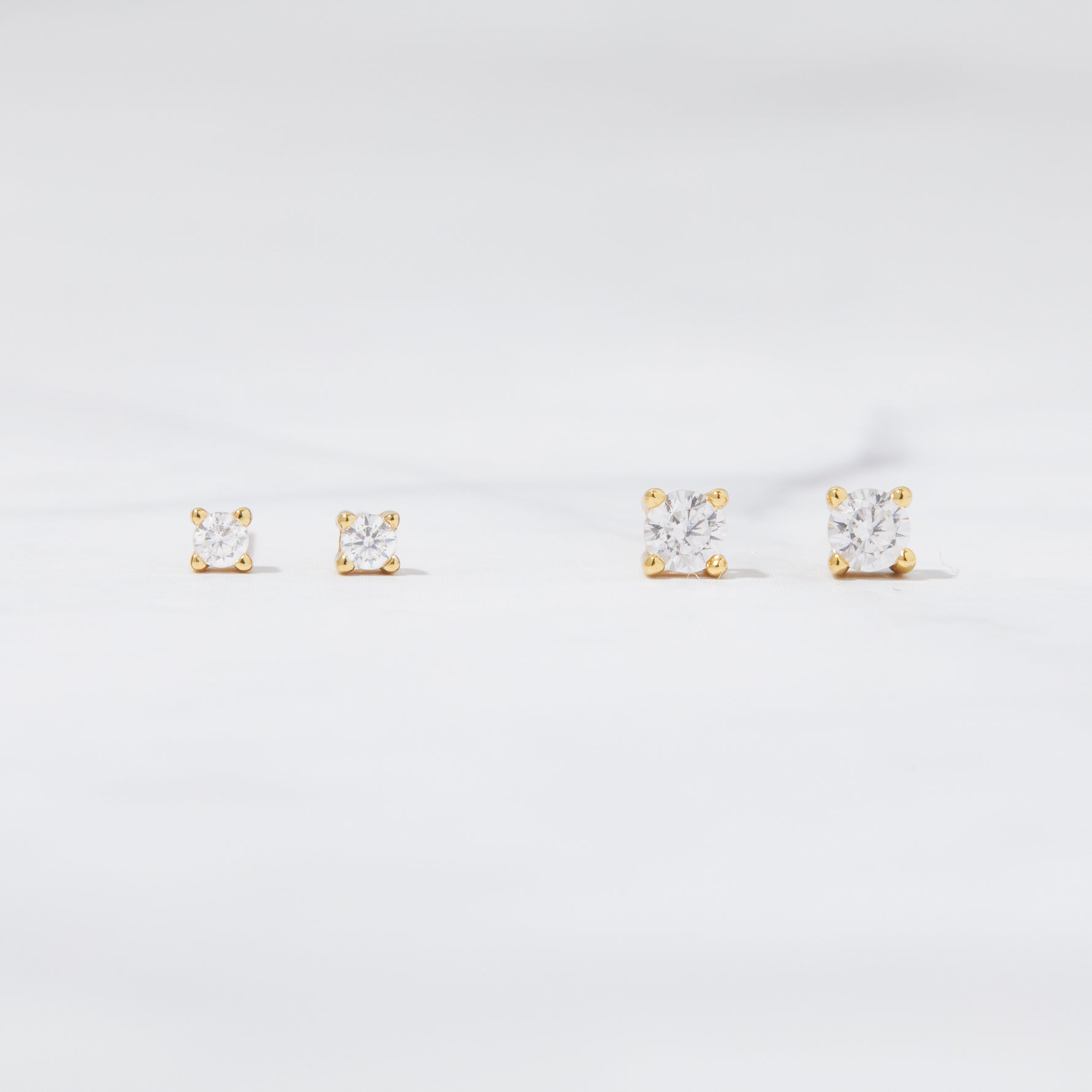 Elegant gold diamond stud earrings. 