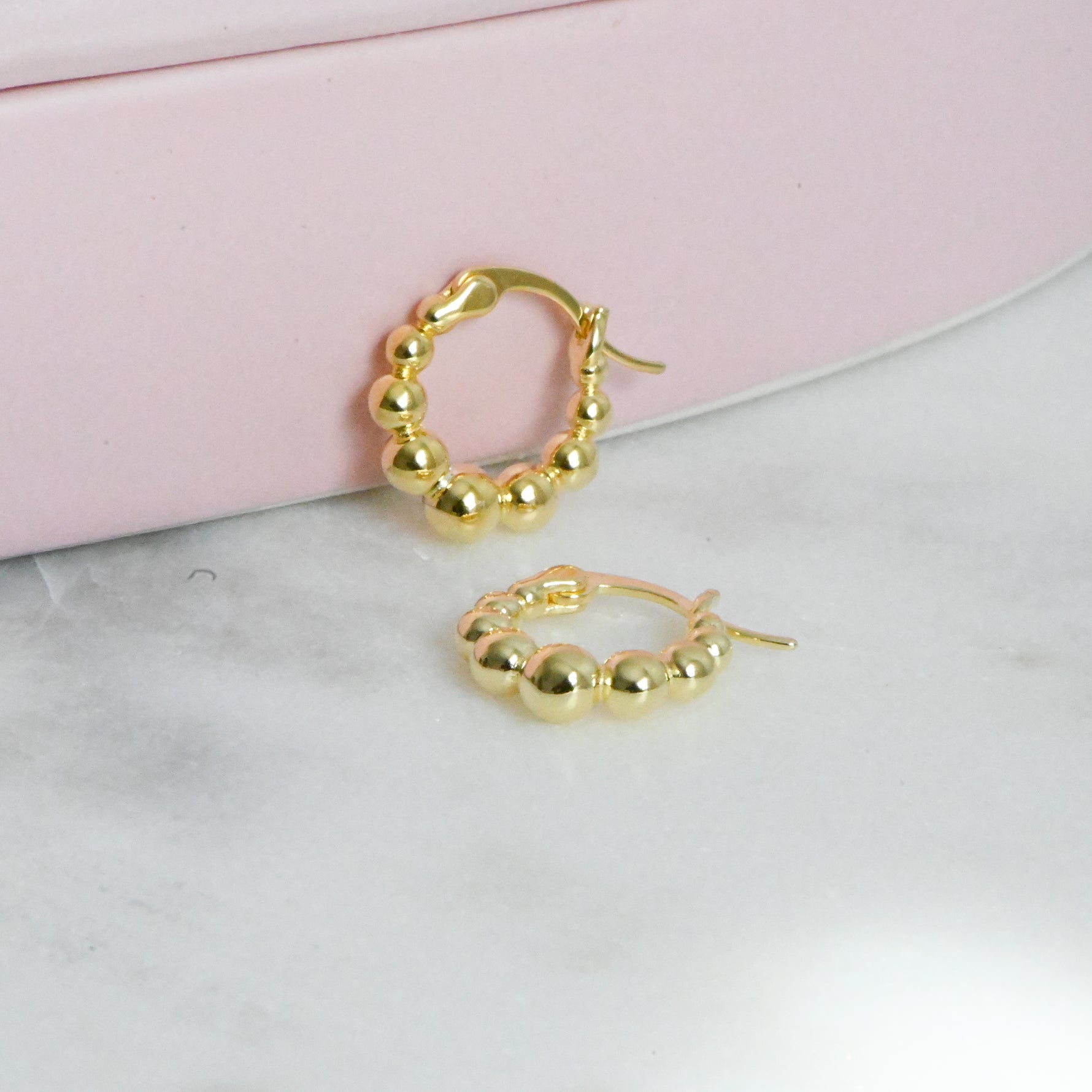 Gold beaded hoop earrings