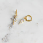 Dainty gold pavé charm earrings with removable dagger spike charm.