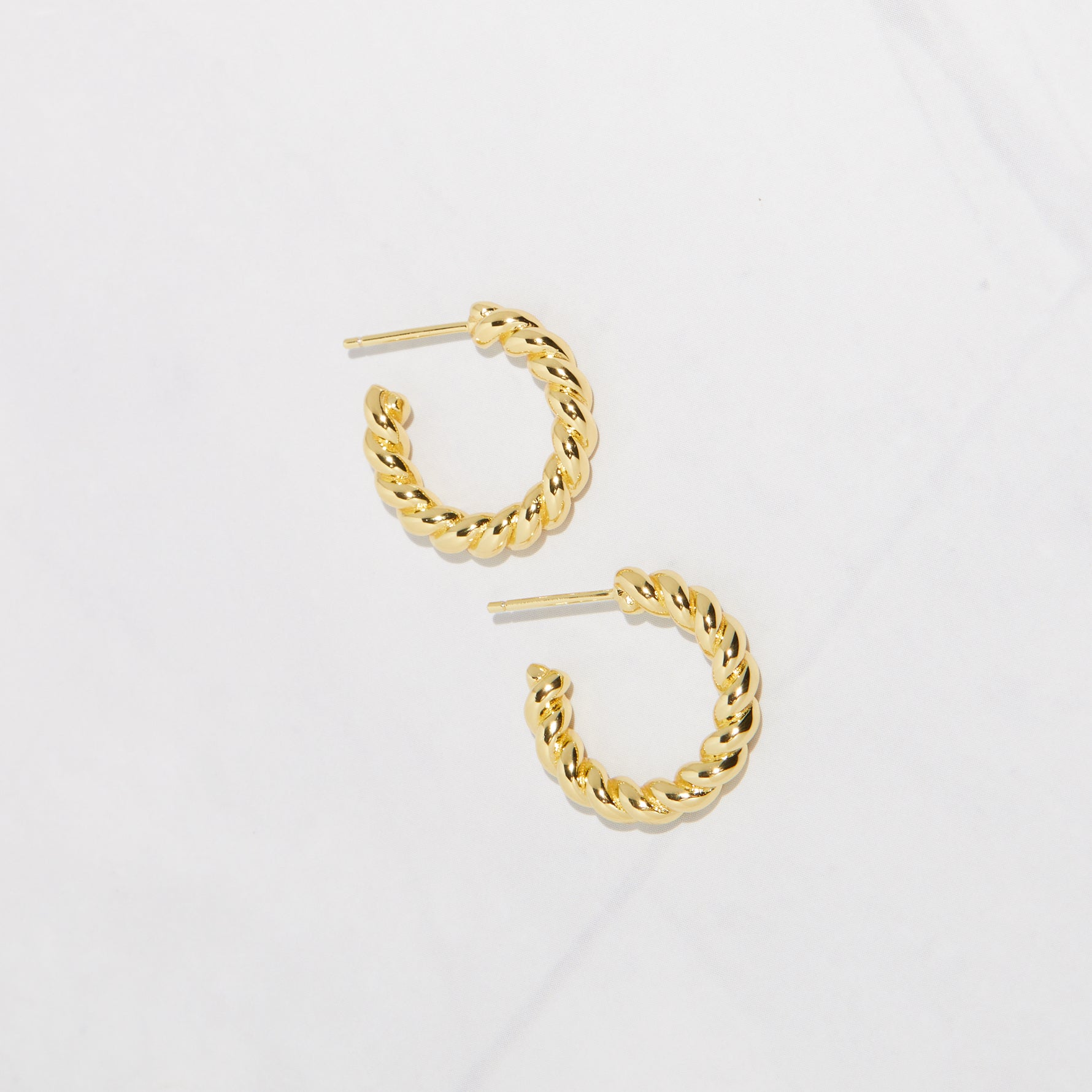 Chunky twisted gold hoop earrings