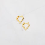 Tiny studded gold geometric huggie earrings. 