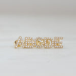 Letters A through E gold stud CZ earrings. 