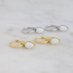 Gold and silver opal tear drop removable charm huggie earrings. 