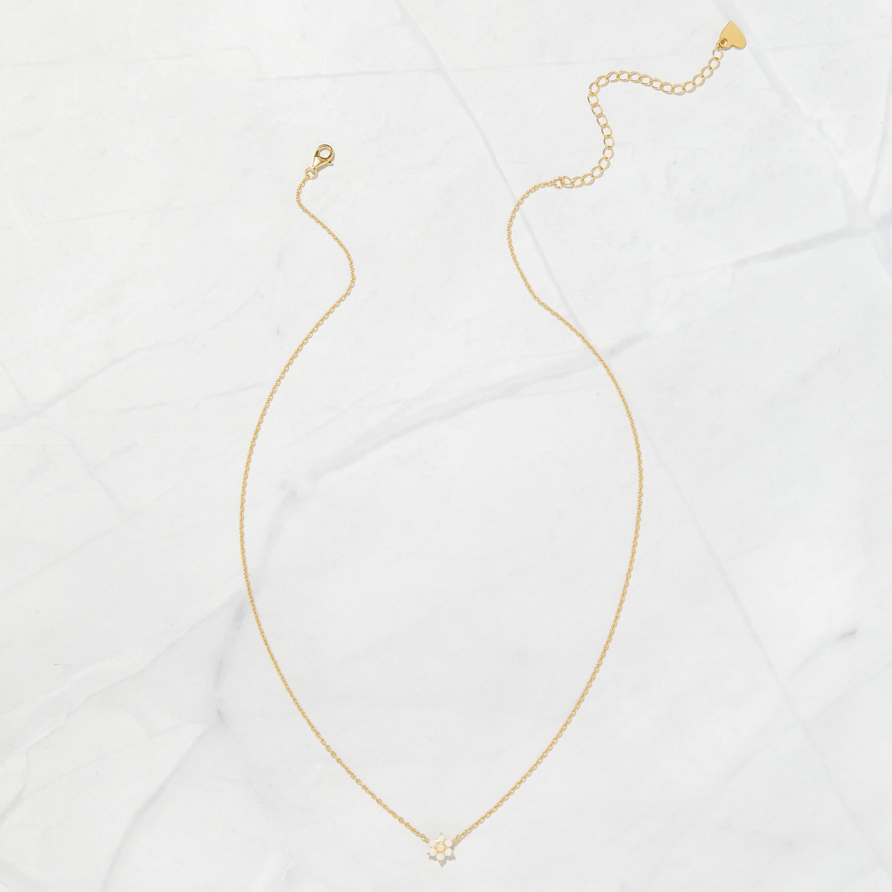Minimalist opal flower gold pendant necklace.