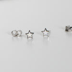 Silver star stud earrings in opal