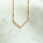 V necklace in rose gold. 
