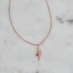 Rose gold dainty lightning bolt pendant necklace.