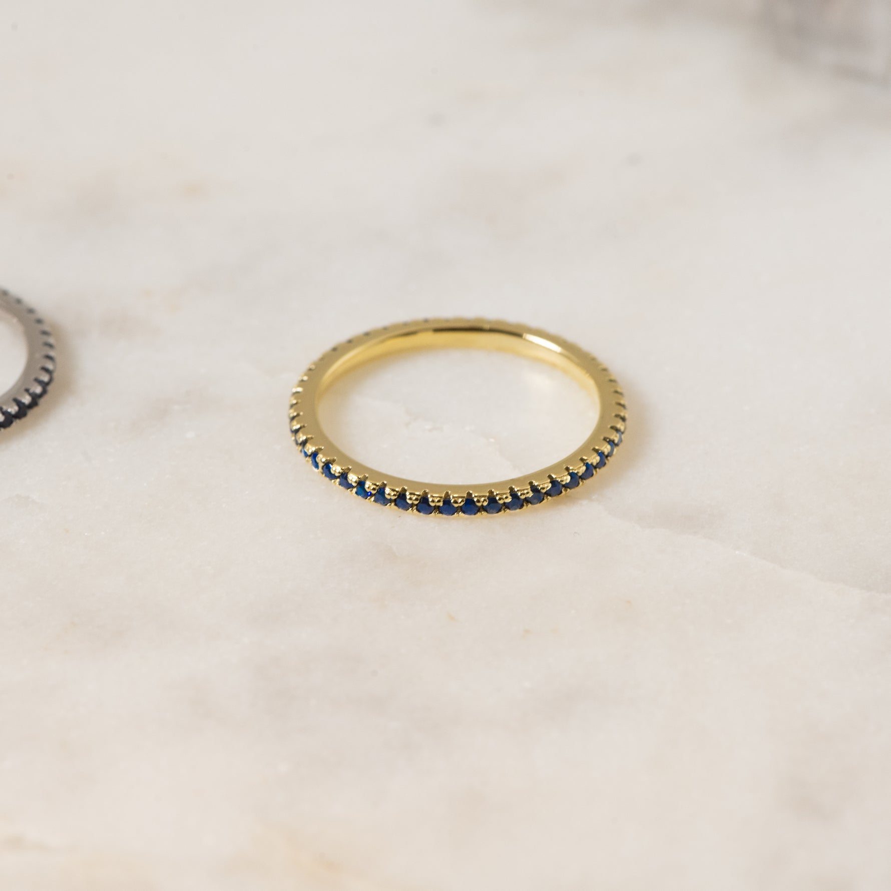 Delicate gold eternity sapphire ring.