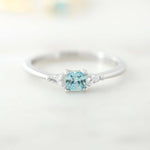 Upclose image of aquamarine cushion cz ring in sterling silver. 