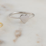 Upclose image of 925 sterling silver plain heart ring.