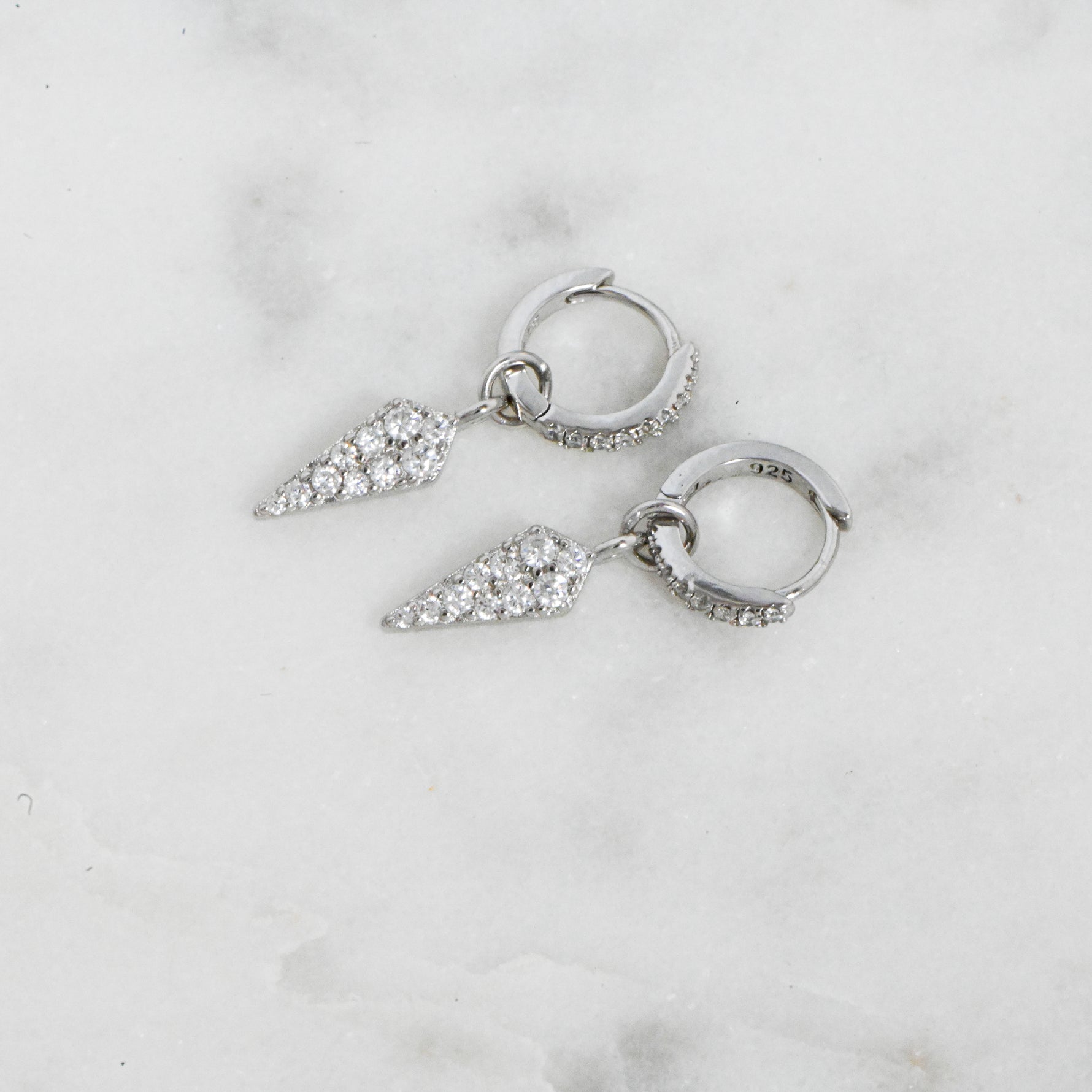 Dainty 925 silver pavé charm earrings with removable dagger spike charm.