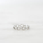 Upclose shot of silver link chain ring.